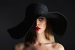 Beautiful blond woman in hat. fashion beauty model girl with red lips