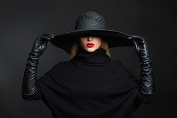 Sticker - Beautiful woman in hat and leather gloves.halloween witch