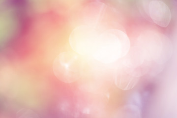 Wall Mural - defocused bokeh twinkling lights abstract background, color filters