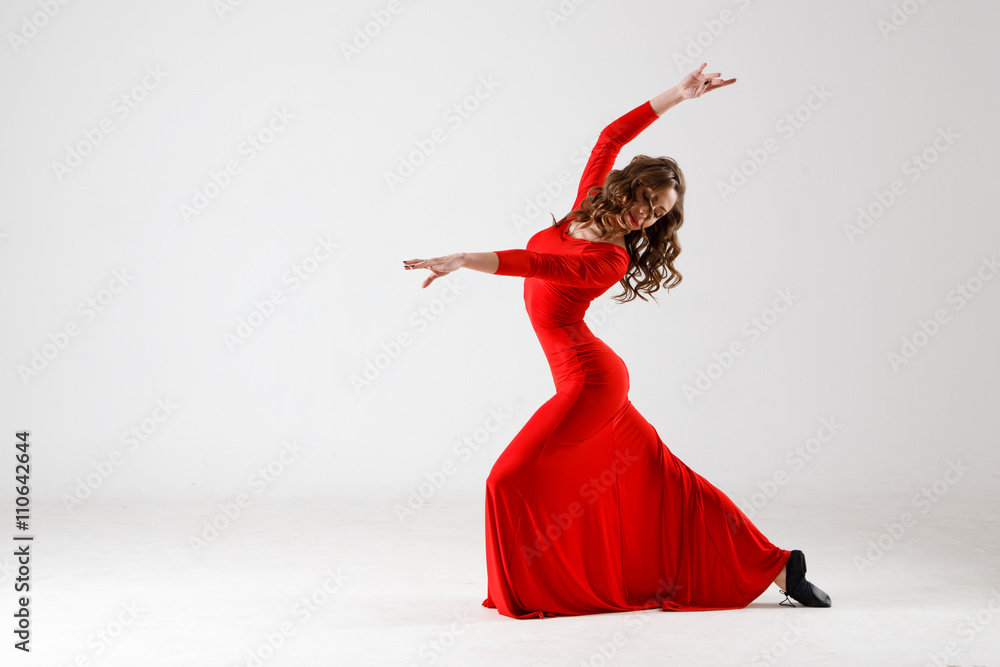 Dancing lady in a red dress. Contemporary modern dance on a white  background isolated. Fitness, stretching model Stock Photo | Adobe Stock