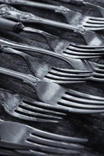 Vintage Forks Shot With Shallow Focus And Blue Tinted Filter