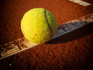 Wall Mural - Tennis balls on a tennis clay court