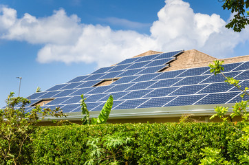 Solar Panels on the Roof of a House. Renewable Energy Concept