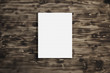 Empty canvas frame on a wooden background. Mock up poster. The proportions of the canvas 4:3