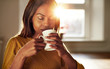 © Flamingo Images - Attractive woman enjoying a cup of fresh coffee