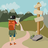 Fototapeta  - hiker with backpack on mountain trail cheks map