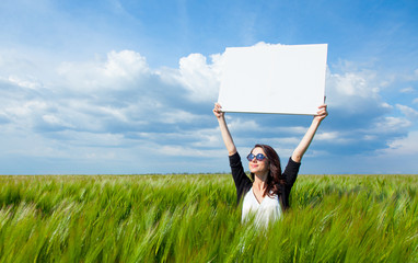 young woman with poster