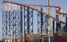 Roller Coaster Ride At Theme Park In Blackpool