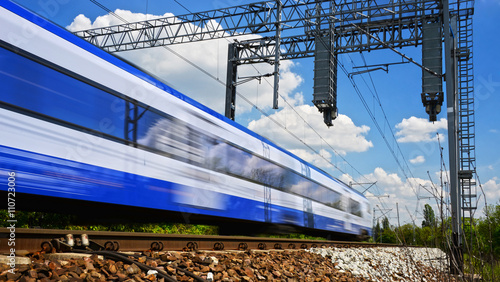 Cuadros en Lienzo Modern electric passenger train moving on full speed