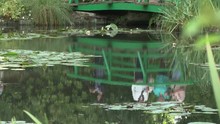 Reflection Of The Japanese Bridge In The Pond Of  Monet’s Garden, Giverny, France
