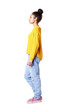 © mimagephotos - Young african woman standing over white background