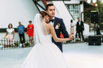 Wall Mural - Emotional first dance of the married couple