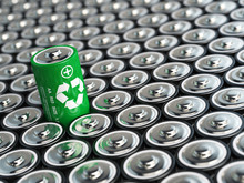Battery Recycling Concept. Green Energy, Background From Battari