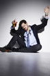 © sanneberg - Drunk businessman sitting in studio