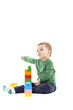 © jinga80 - Cute little boy playing with colorful blocks