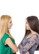 © jinga80 - Closeup portrait of two teenage girls standing face to face