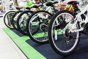 Sportive mountain bike row in the store