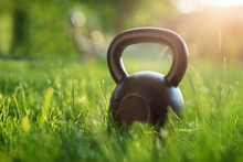 Outdoor Photo From A Kettlebell In A Park, Sunset In The Background