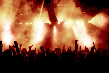 Poster - silhouettes of concert crowd in front of bright stage lights