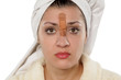 unhappy young woman with patch between the eyebrows