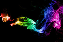 Colored Abstract Smoke, Isolated On Black Background. Photo. Acid Neon Color.