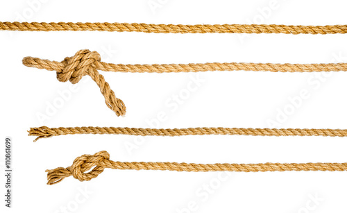Photographie Ship ropes with knot isolated on white background