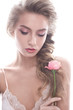 © iulskaya_photo - Beautiful girl in image of bride with а flower. Beauty face.
