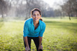 © Connect Images - Portrait of young woman taking training break in park
