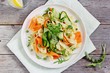Summer pasta with zucchini ,carrots,green pea and arugula. Healthy eating.Selective focus