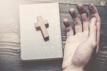 Canvas Print - cross, book and man hand