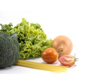 Wall Mural - Fruits and vegetables,Lettuce, Broccoli,onion, broccoli, tomatoes, spaghetti isolated.on white background.corner.left