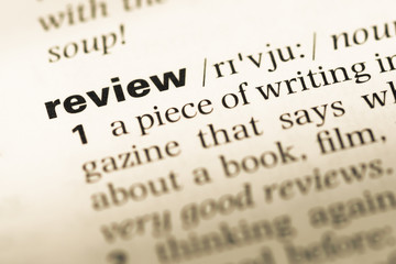 Wall Mural - close up of old english dictionary page with word review