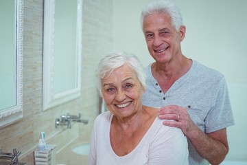 Wall Mural - Portrait of senior couple in bathroom