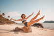 © zolotareva_elina - happy summer girl in 50s swimsuit on the beach