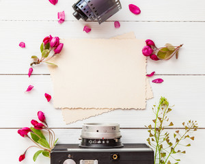 Empty photo frame for the inside, retro camera, photo film roll