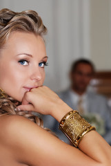 Closeup portrait of elegant woman looking at the camera. Wedding style. Ancient greek style.