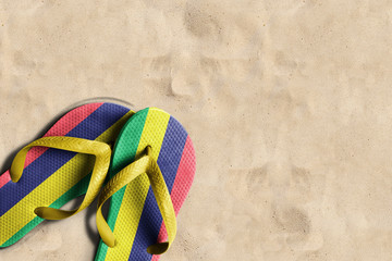 Wall Mural - Thongs with flag of Mauritius, on beach sand