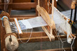 The production process of the handmade textiles on the loom