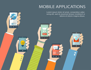 Mobile application concept. Hands holding phones.