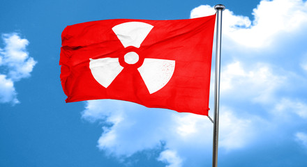 Wall Mural - Nuclear danger background, 3D rendering, a red waving flag
