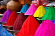 Colored powders at market in Pisac, Peru