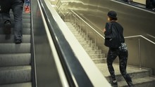 Young Sportive Woman Goes Upstairs Instead Using Escalator Slow Motion