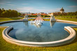 Beautiful fontain in Belvedere with lower palace and park on the background. Wide angle image with long exposure technic