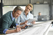 © goodluz - Team of architects working together on project