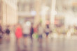 © tonktiti - Blur people walking in shopping center mall abstract background.