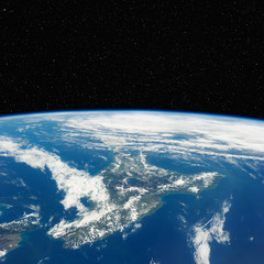 new zealand from space with stars above. includes nasa data.
