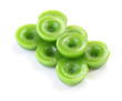 © keerati - Group of green multiple scented chinese sweet on white floor.