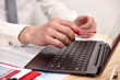 © vetkit - Businessman hand pointing to screen laptop