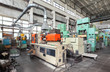 Machinery plant. Workshop for production of  thermoplastic parts. Injection molding plastic machine and hydraulic press