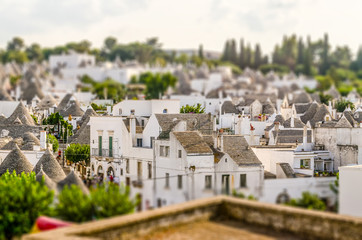 Scenic view of Alberobello and trulli, Italy. Tilt-shift effect applied